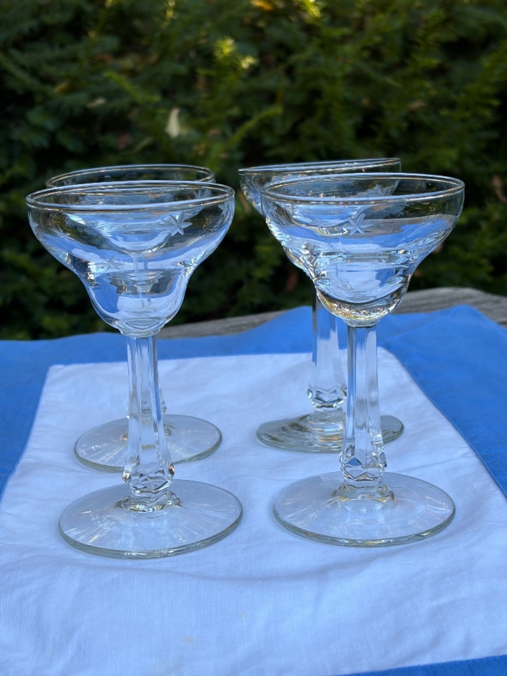 Set of 4 MCM vintage champagne glasses, with little stars.
